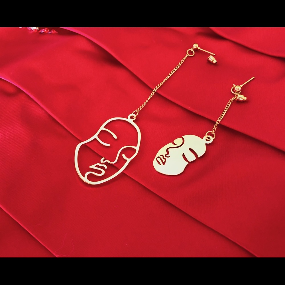 Gold color Face earrings